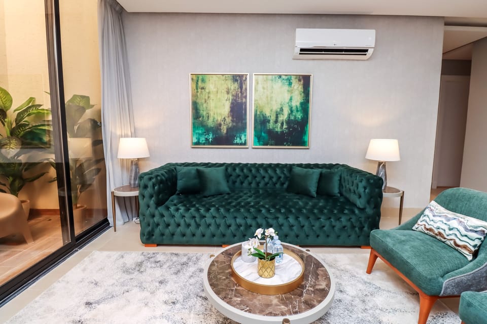 Apartment, 3 Bedrooms | Living area | 32-inch LCD TV with cable channels, TV