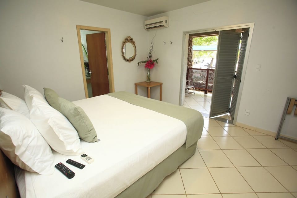 Deluxe Studio Suite | Minibar, blackout drapes, free WiFi, bed sheets