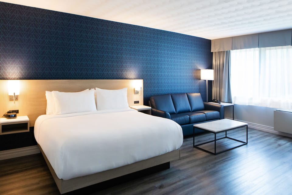 Deluxe King | Premium bedding, down comforters, pillowtop beds, individually decorated