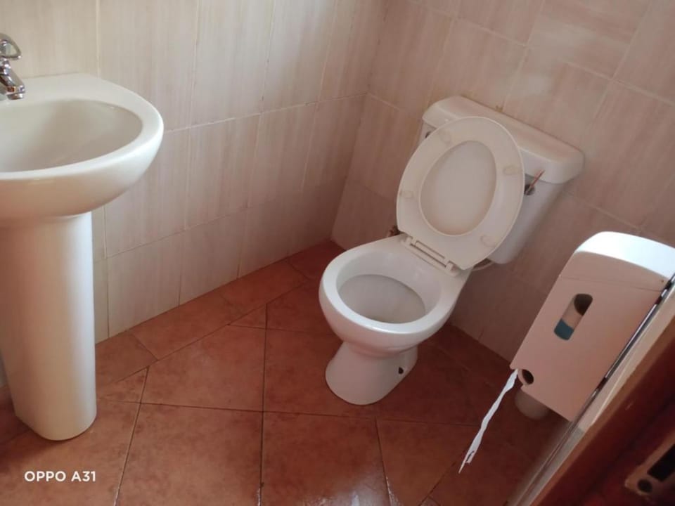 Standard Room | Bathroom | Combined shower/tub, slippers, towels