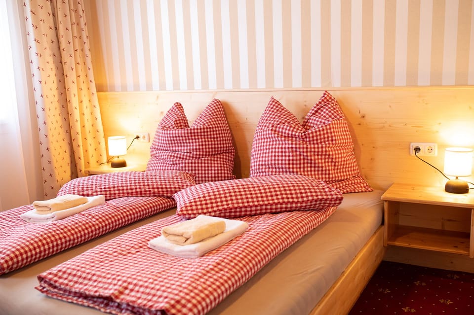 Frette Italian sheets, premium bedding, down comforters