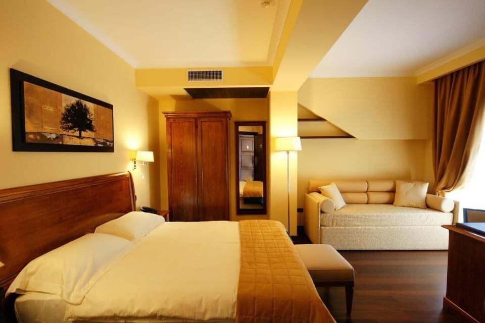 Deluxe Triple Room | Frette Italian sheets, premium bedding, down comforters