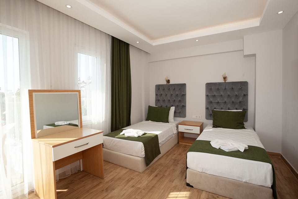 Premium bedding, laptop workspace, free WiFi, bed sheets