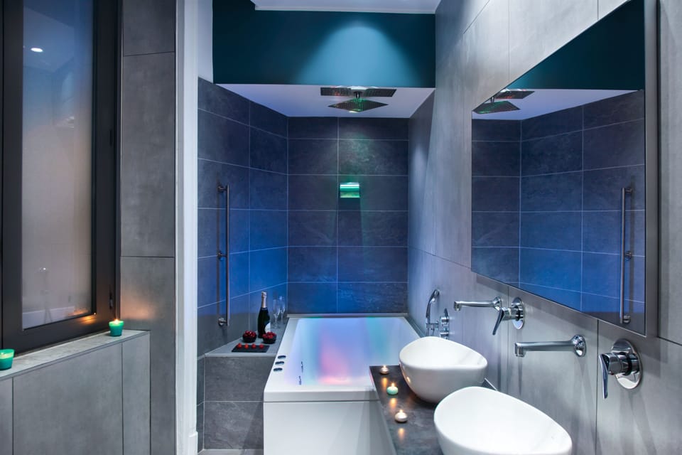 Luxury Room, Non Smoking, City View | Bathroom | Combined shower/tub, jetted tub, hydromassage showerhead