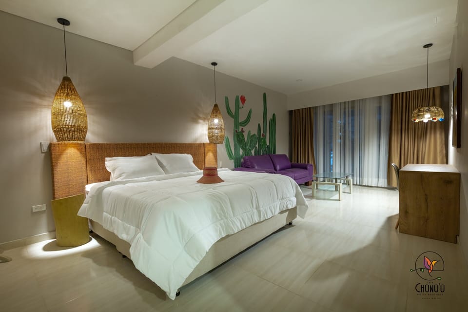Deluxe Suite | Premium bedding, down comforters, minibar, in-room safe