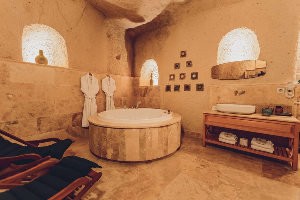Jupiter - Fully Cave & Jacuzzi | Bathroom | Hair dryer, slippers, towels, soap