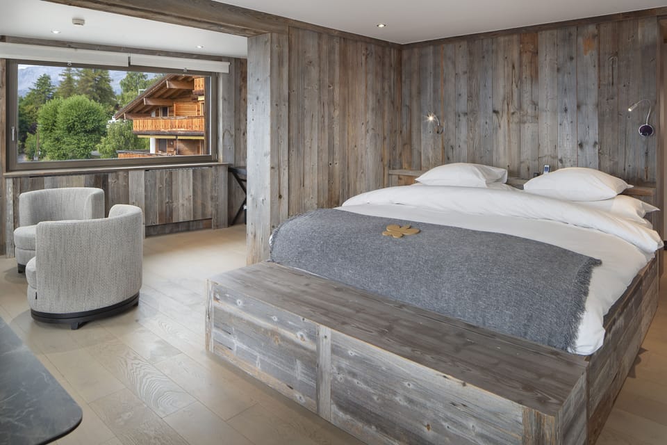 Superior Quadruple Room | Minibar, in-room safe, individually decorated, desk
