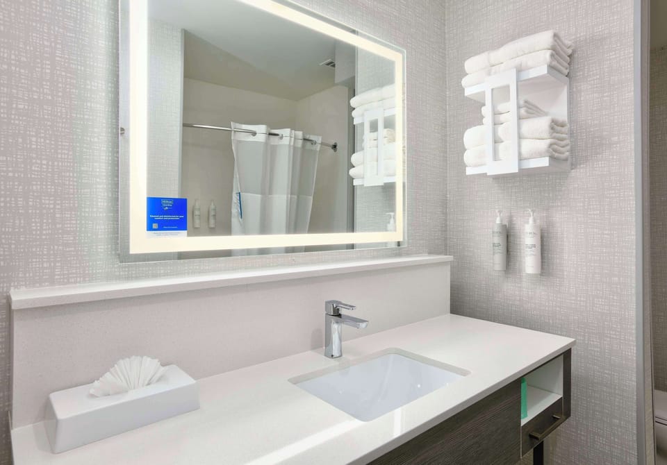 Room, 2 Queen Beds, Refrigerator & Microwave | Bathroom | Combined shower/tub, towels, soap