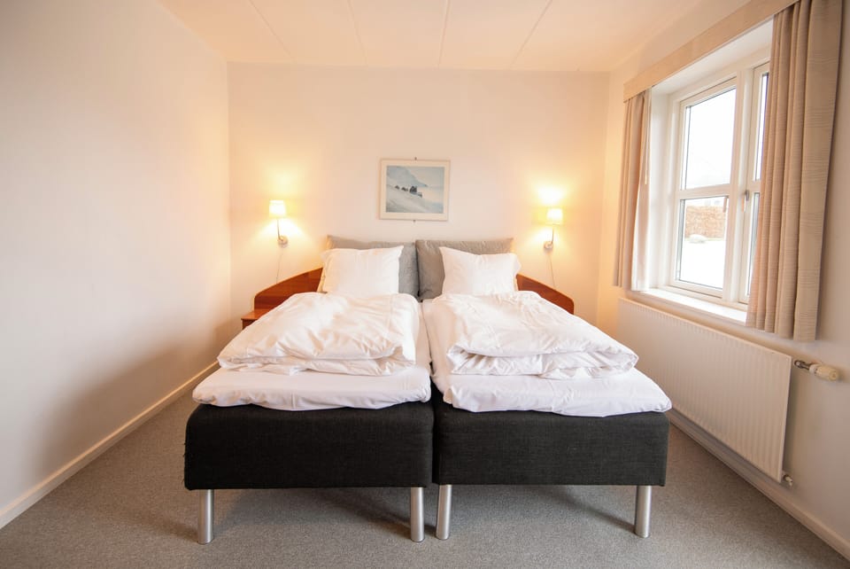 Hypo-allergenic bedding, desk, laptop workspace, iron/ironing board