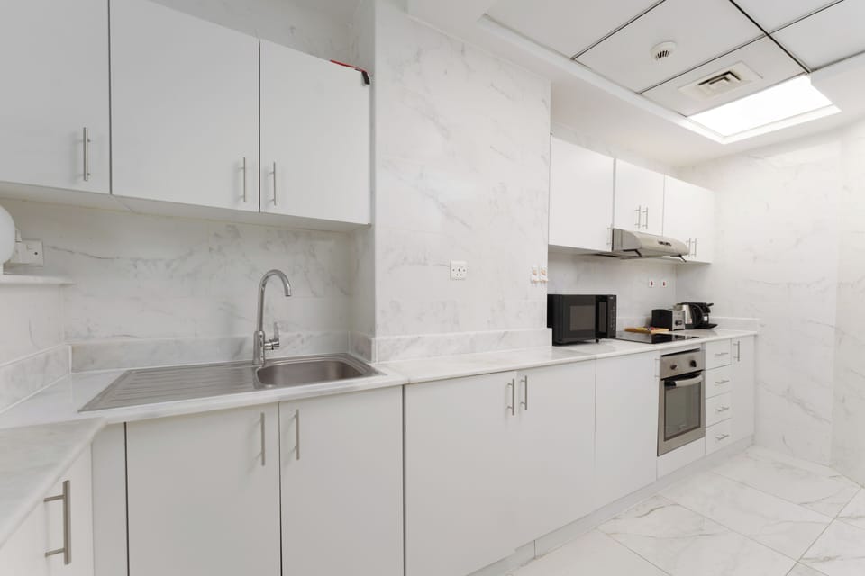 Comfort Apartment | Private kitchen | Fridge, microwave, oven, stovetop