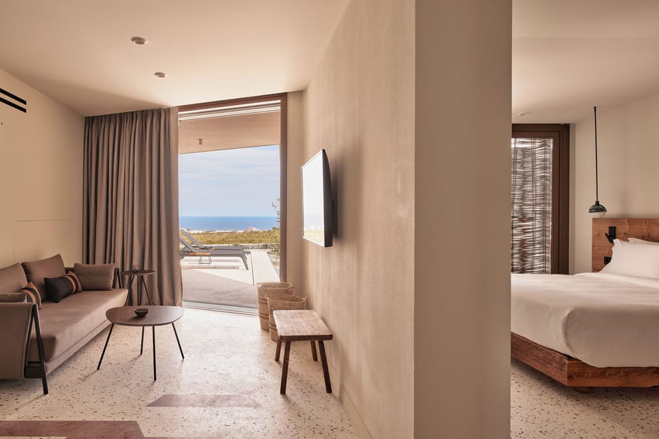 Euphoria Private Pool Suite | Living area | 40-inch Smart TV with satellite channels, TV