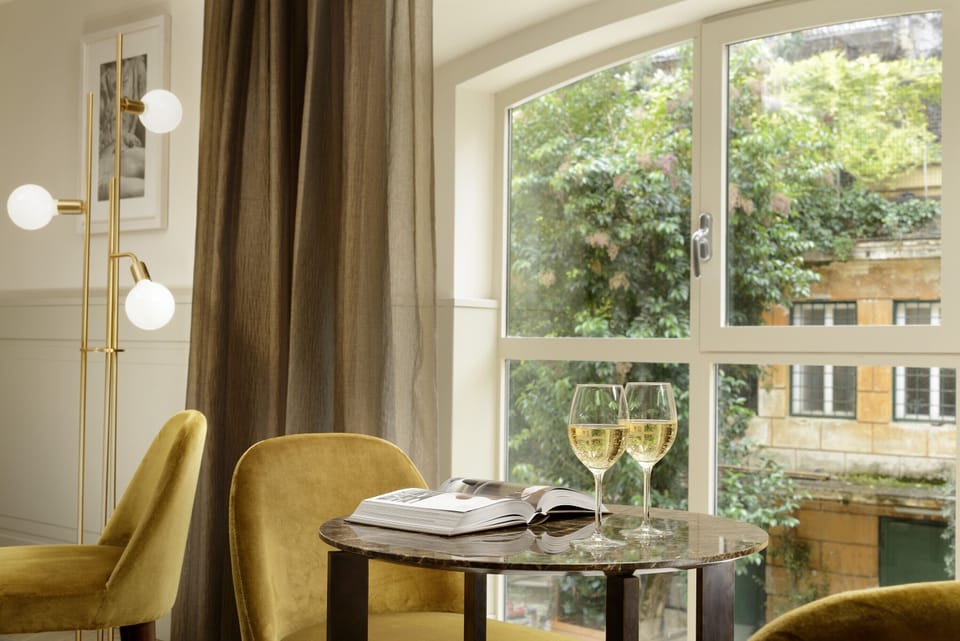 Studio Suite | Living area | 50-inch flat-screen TV with satellite channels, TV