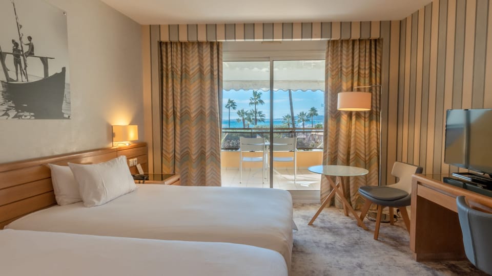 Premium Room, 2 Double Beds, Balcony, Sea View | Minibar, in-room safe, desk, laptop workspace