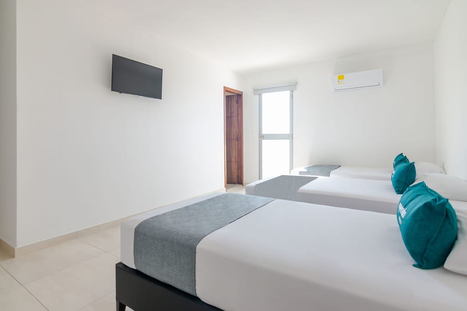 Triple Room | Hypo-allergenic bedding available, minibar