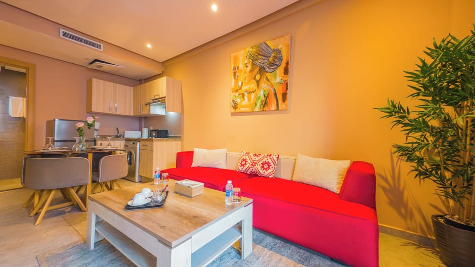 Deluxe Suite, 2 Queen Beds | Living area | 48-inch Smart TV with satellite channels, Netflix, streaming services