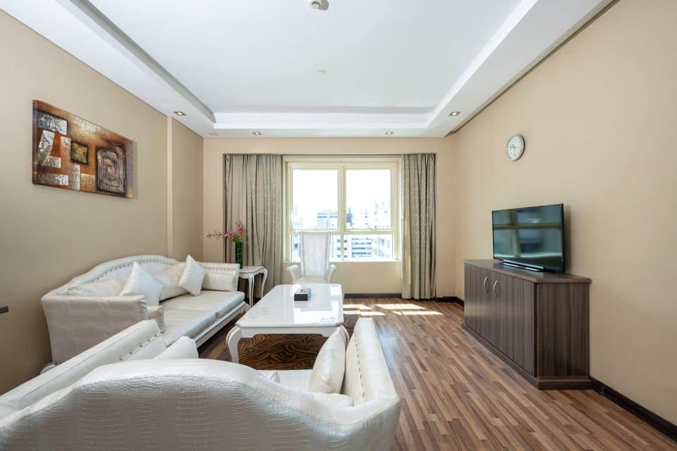 Family Suite, 1 Bedroom, City View | Egyptian cotton sheets, premium bedding, memory foam beds, minibar