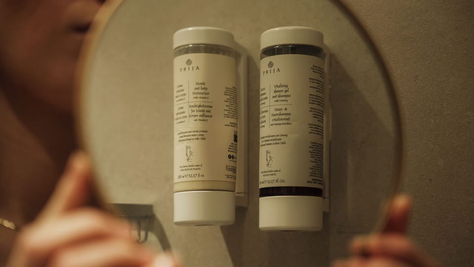 Hair dryer, towels, soap, shampoo