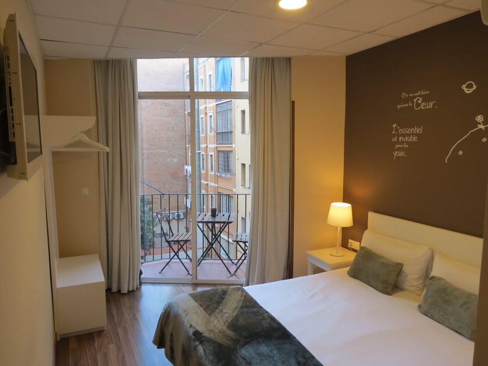 Double Room, Terrace | Blackout drapes, iron/ironing board, free WiFi, bed sheets