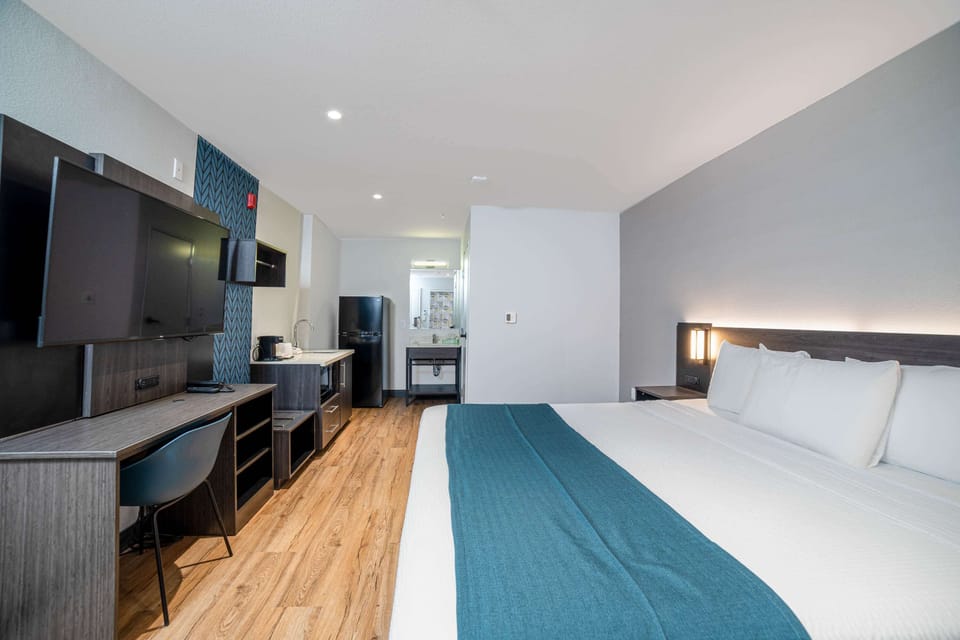 Premium bedding, Select Comfort beds, desk, iron/ironing board