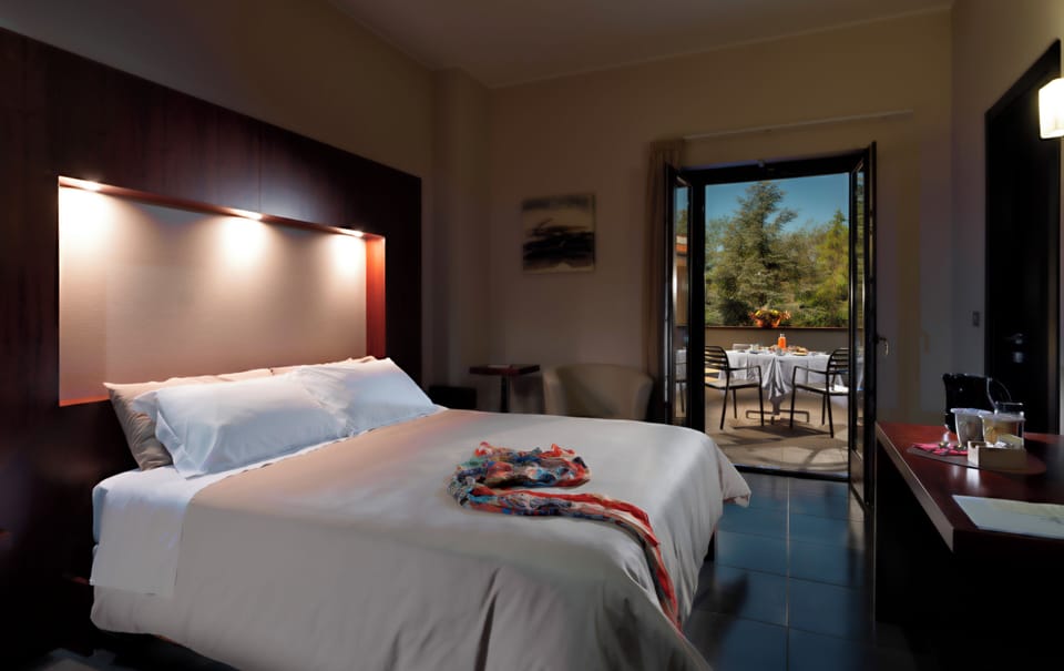 Junior Suite, Terrace | In-room safe, blackout drapes, free WiFi, bed sheets