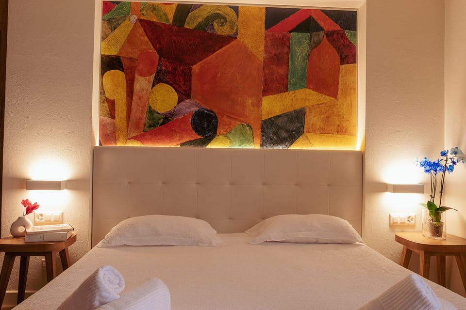 Superior Double Room, Multiple Beds | Minibar, in-room safe, desk, laptop workspace