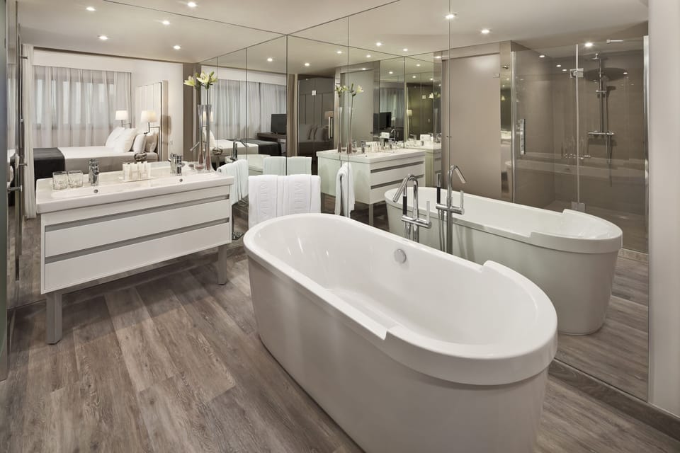 Eco-friendly toiletries, hair dryer, bathrobes, bidet