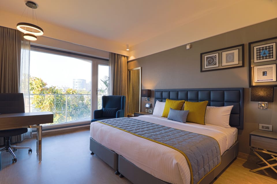 Premium Room | In-room safe, desk, laptop workspace, blackout drapes