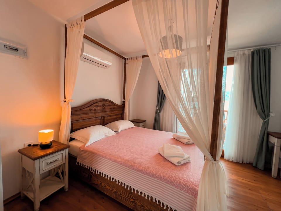 Deluxe Triple Room, Pool View | Egyptian cotton sheets, premium bedding, minibar, desk
