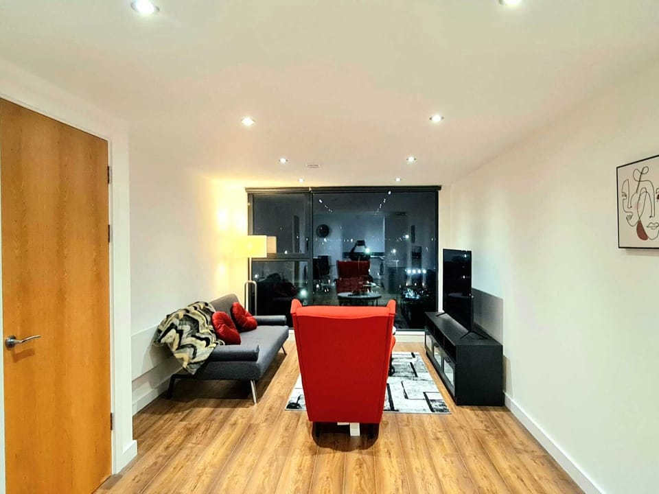 Apartment | Living room | 30-inch TV with cable channels