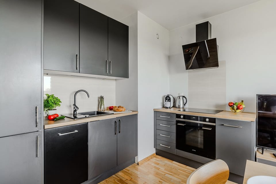 Deluxe Apartment | Private kitchenette | Oven, stovetop, dishwasher, electric kettle