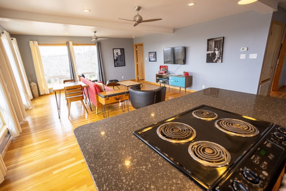 The Loft at Stardust Retreat | Private kitchen | Shared fridge, microwave, cookware/dishes/utensils, paper towels