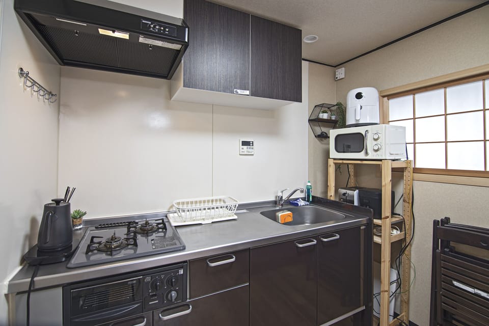 Elite Villa | Private kitchen | Fridge, microwave, stovetop, electric kettle