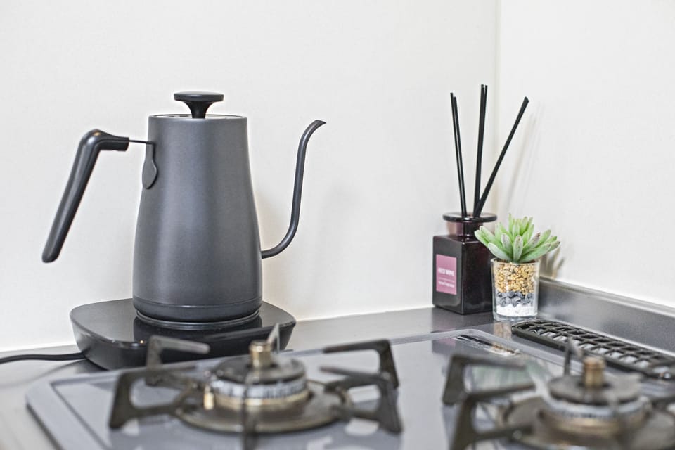 Elite Villa | Private kitchen | Fridge, microwave, stovetop, electric kettle
