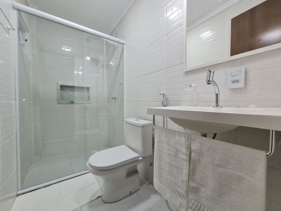 Shower, rainfall showerhead, towels, soap