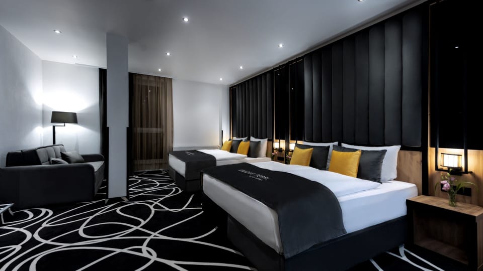 Family Room | Hypo-allergenic bedding available, down comforters, in-room safe, desk