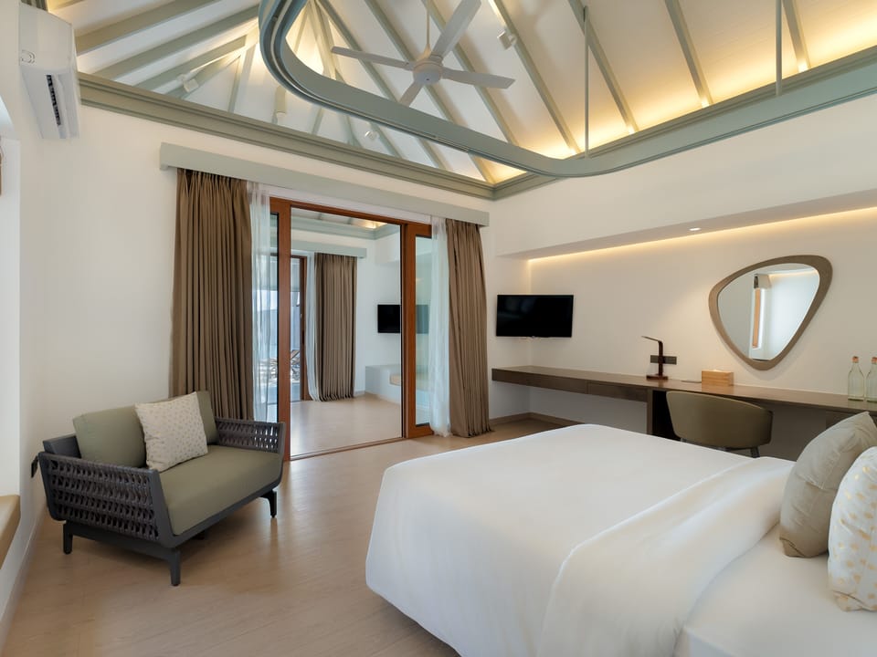 Grand Beach Suite with Pool | Minibar, in-room safe, desk, blackout drapes