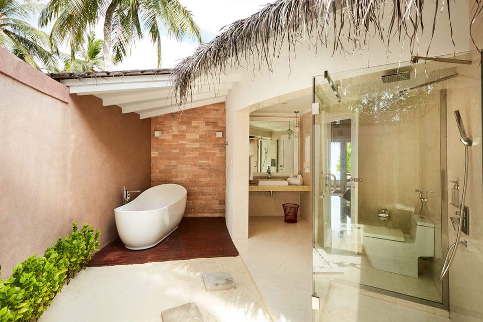 Separate tub and shower, free toiletries, hair dryer, bathrobes