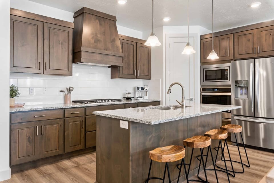Townhome, 4 Bedrooms | Private kitchen | Fridge, oven, coffee/tea maker, toaster