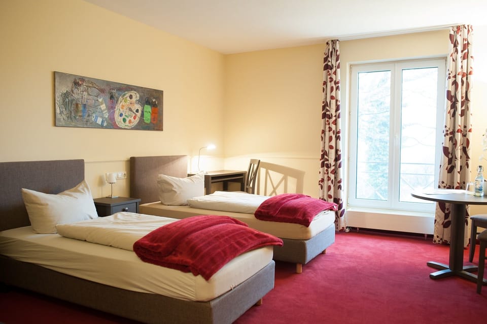 Comfort Double Room, Garden View | Living area | 32-inch flat-screen TV with satellite channels, TV