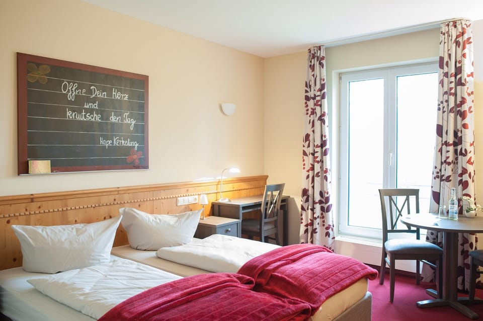 Hypo-allergenic bedding, minibar, laptop workspace, blackout drapes