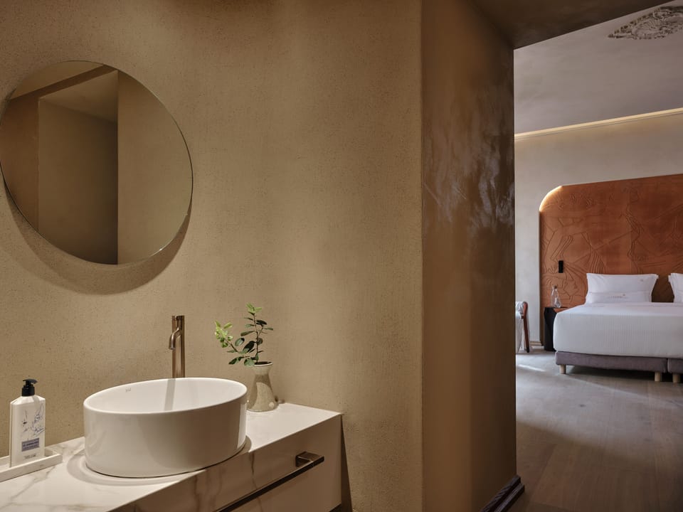 Junior Suite, City View | Bathroom | Shower, rainfall showerhead, designer toiletries, hair dryer