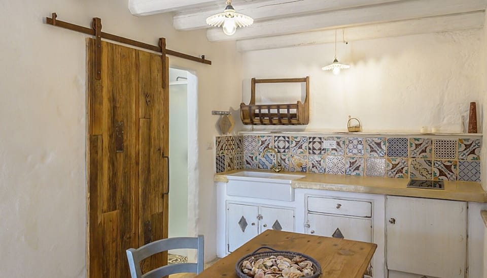 Deluxe Villa | Private kitchen | Full-size fridge, stovetop, electric kettle, cookware/dishes/utensils