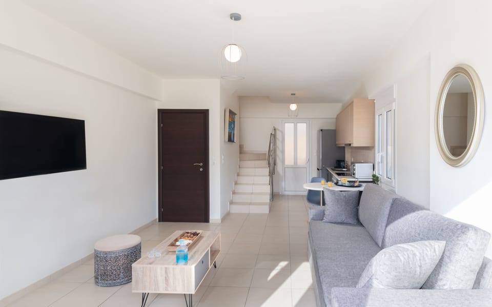 Panoramic Apartment | Living area | 55-inch Smart TV with satellite channels, TV