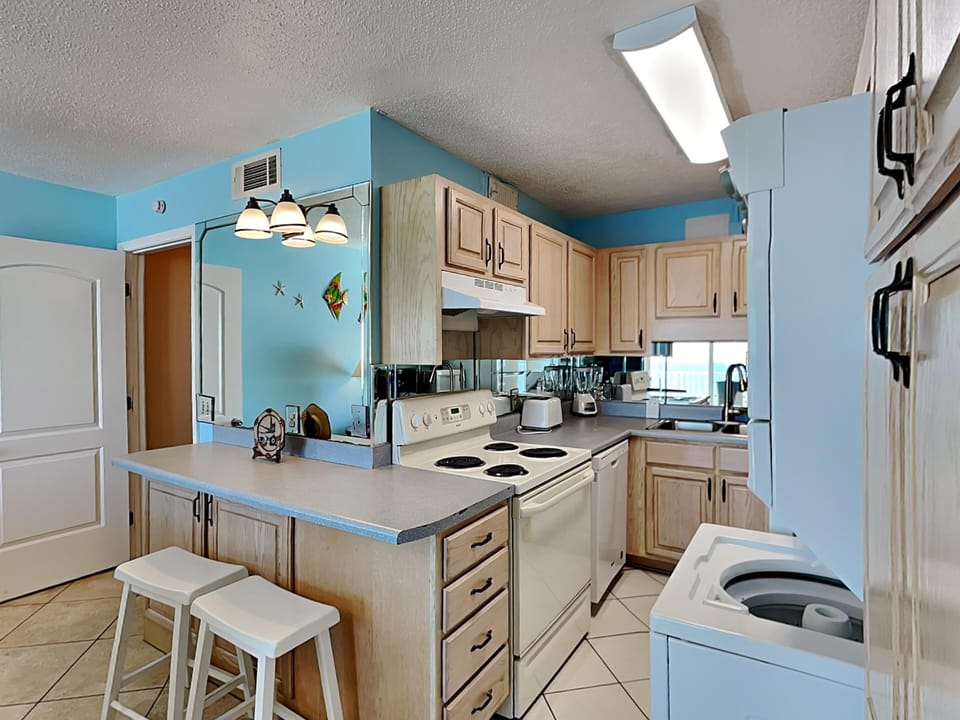 Condo, Multiple Beds, Balcony, Ocean View (Summit Beach Resort #1231) | Private kitchen | Fridge, microwave, oven, stovetop