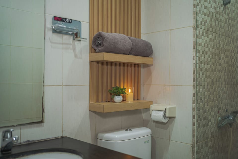 Shower, free toiletries, towels, soap