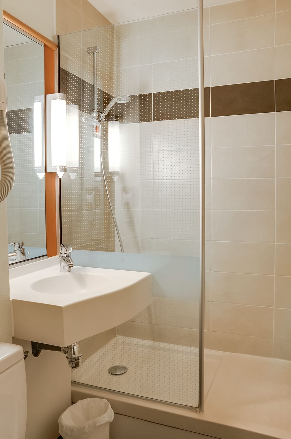 Shower, eco-friendly toiletries, hair dryer, towels