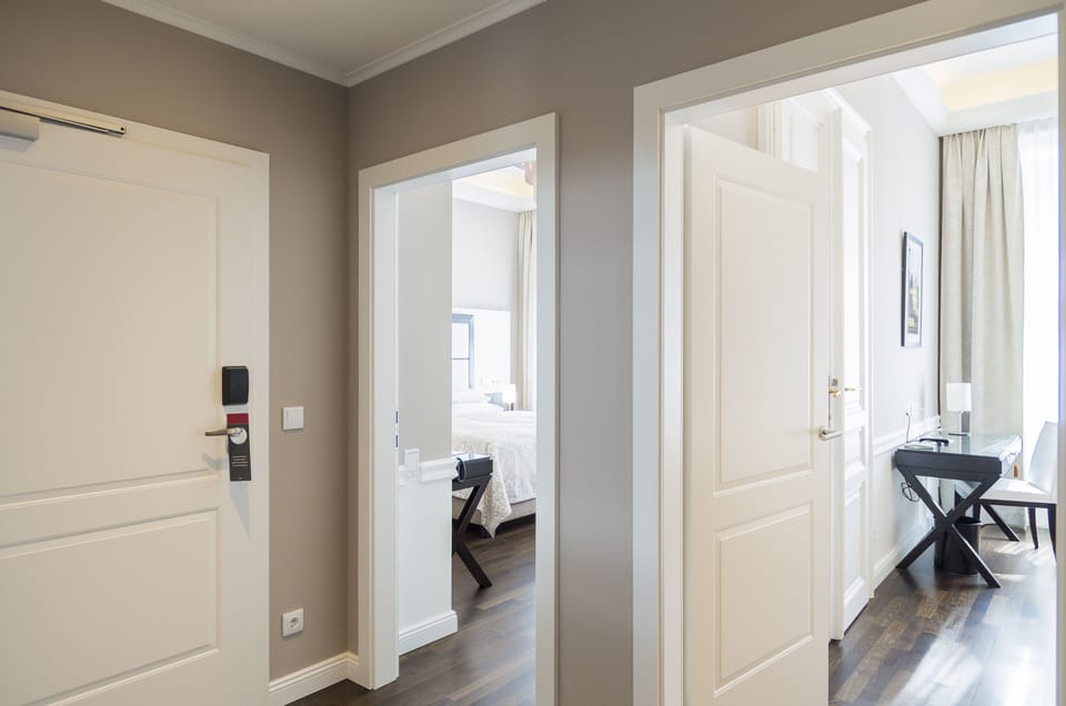 Junior Suite, 2 Bedrooms | Premium bedding, minibar, in-room safe, desk