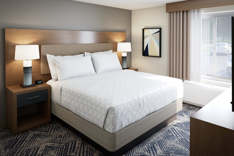Down comforters, pillowtop beds, desk, blackout drapes