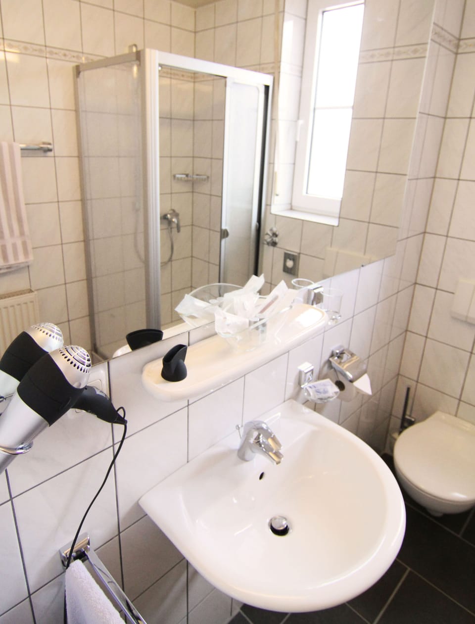 Shower, free toiletries, hair dryer, towels