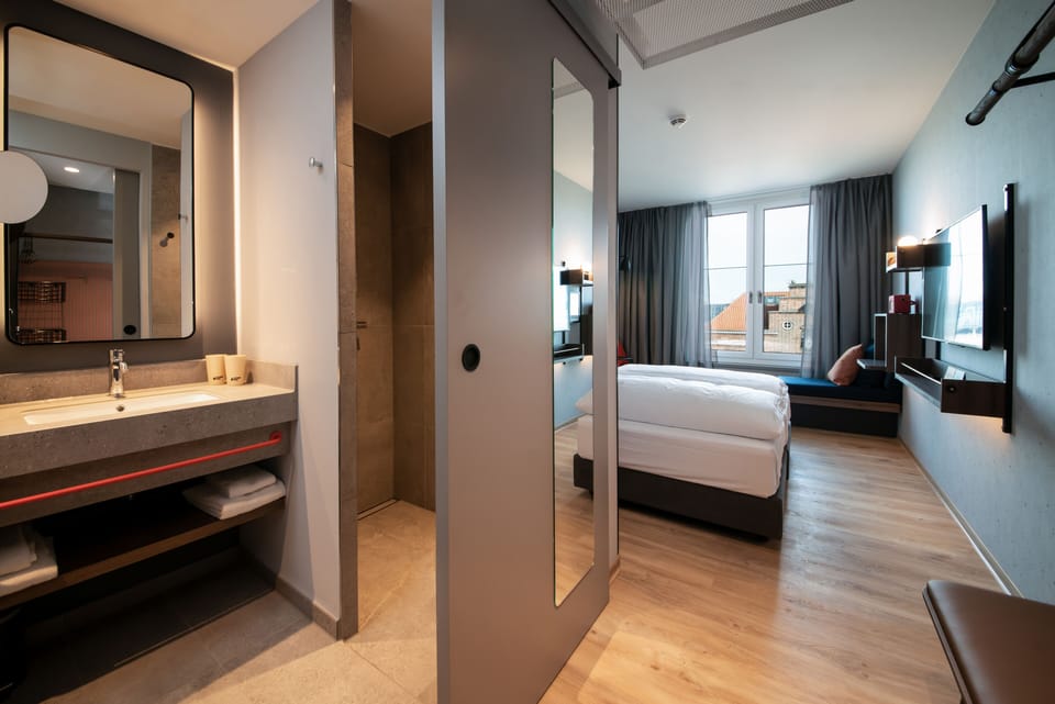 Shower, eco-friendly toiletries, hair dryer, towels